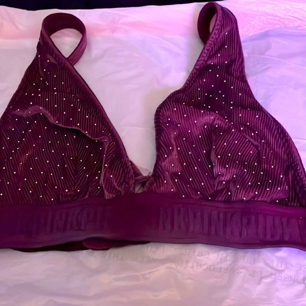 Purple and a black sports bra will sell together for 40.00 or separate for 25.00